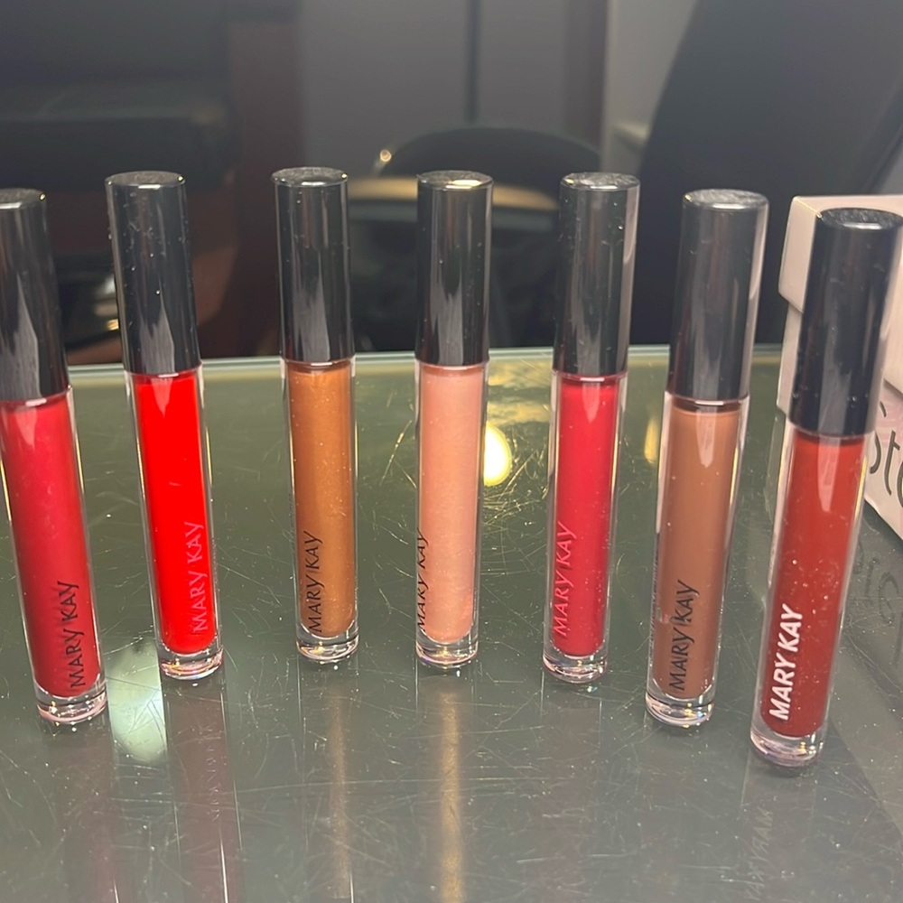Mary Kay Unlimited lip gloss 14 different shades .13 fl. Oz.